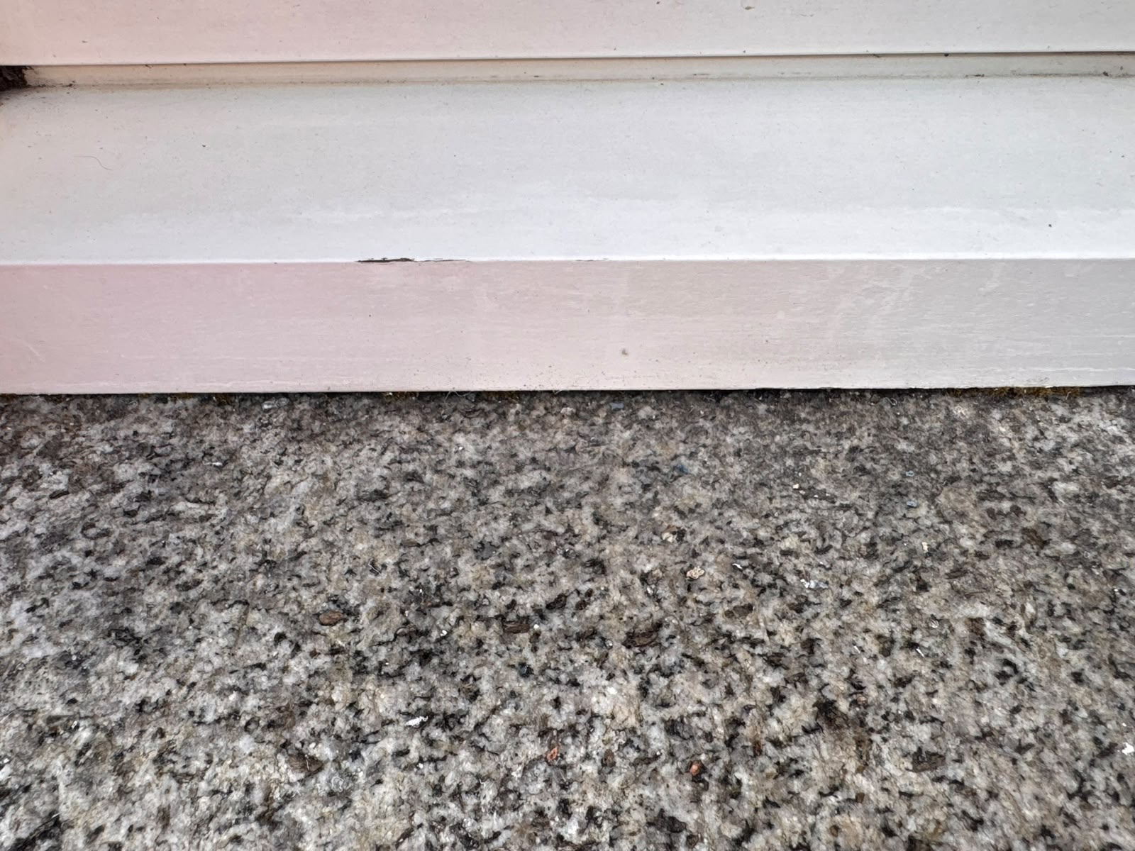 The same granite window plinth after treatment — rust stain fully removed